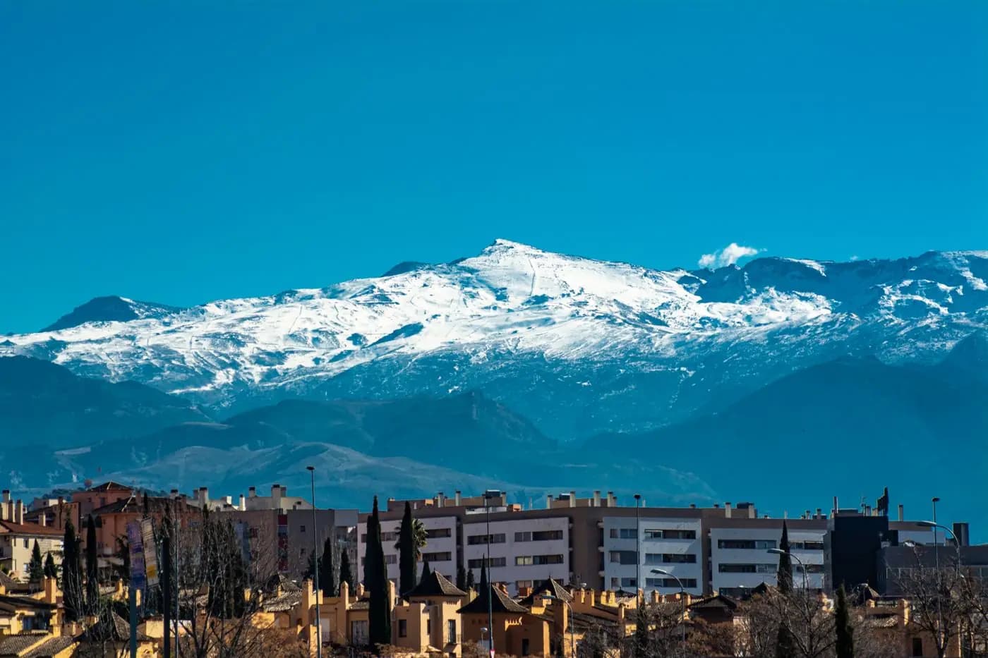 Snow-covered Sierra Nevada rising above Granada