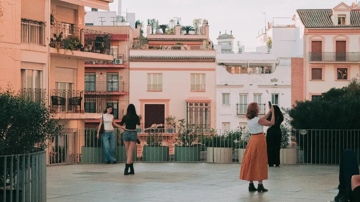 A group on a rooftop terrace in Seville in the evening