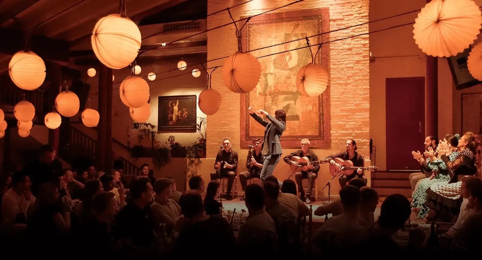 Flamenco show at Tablao de Carmen in Barcelona under orange lanterns
