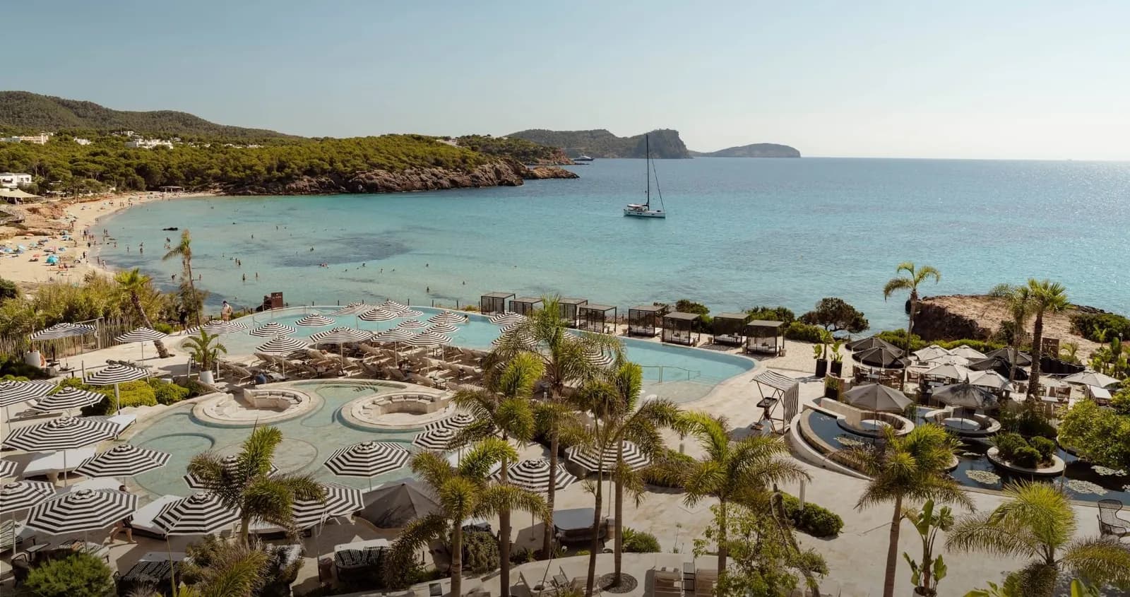 Aerial view of BLESS Ibiza Cala Nova and the Es Canar bay, Ibiza
