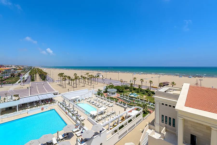 Hotel pool terrace facing the beach in Valencia