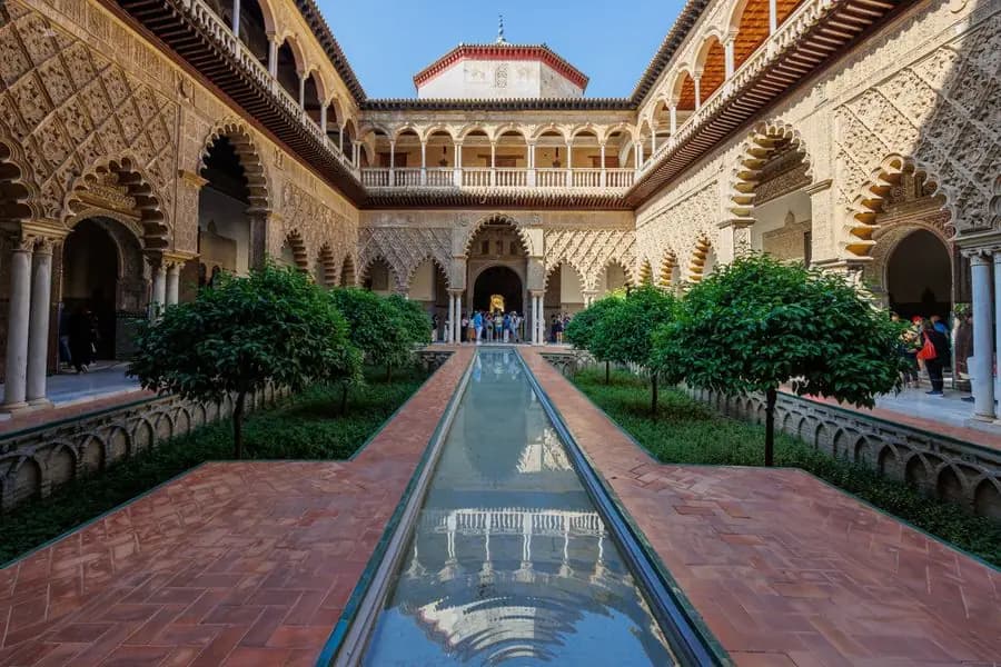 Mudéjar courtyard with reflecting pool in the Real Alcázar, Seville