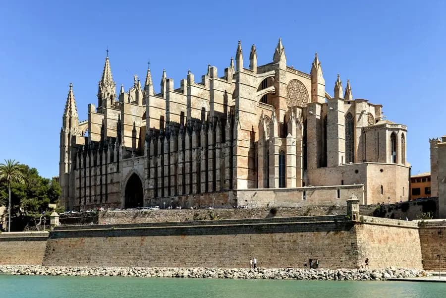 Gothic facade of Palma Cathedral by the waterfront