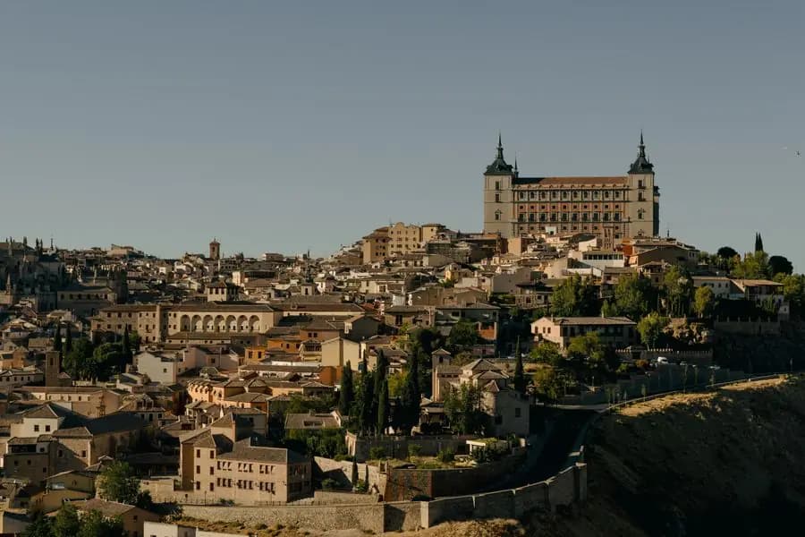 View of Toledo and its Alcázar under a clear sky