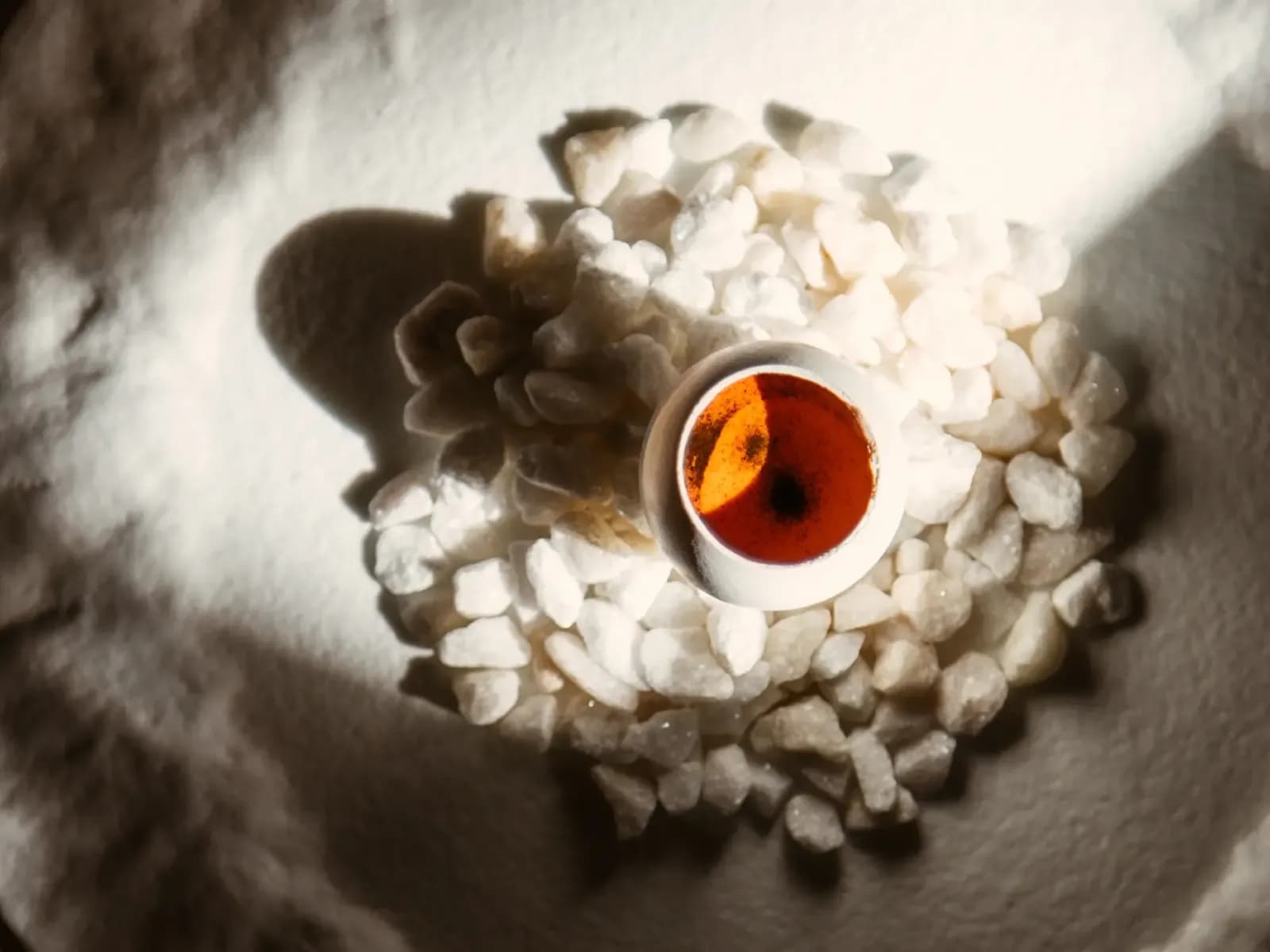 Culinary creation on white pebbles at La Gaia restaurant in Ibiza