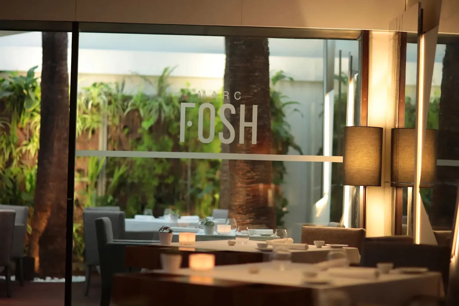 Marc Fosh restaurant entrance in Palma with sign and tropical plants