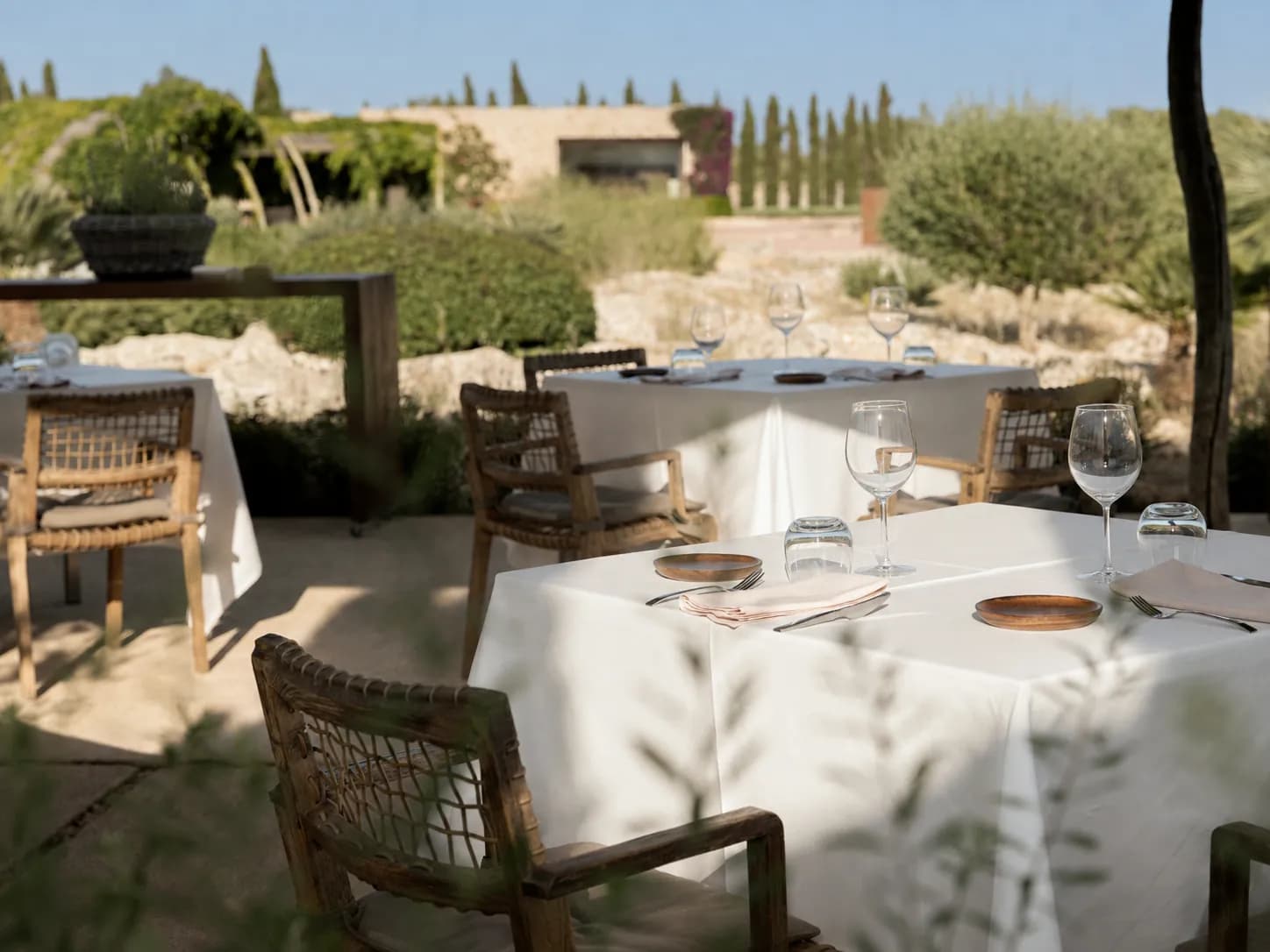 Terrace tables set at Torralbenc restaurant in Alaior, Menorca