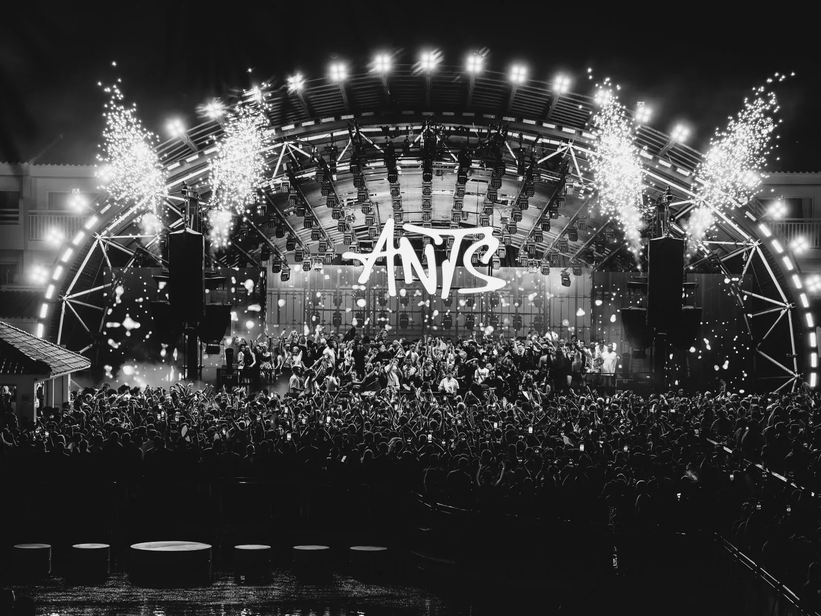 Ushuaïa Ibiza stage at night with fireworks and crowd below