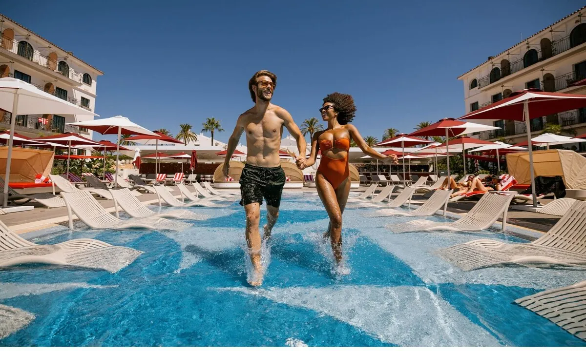 Pool and sun loungers at Hard Rock Hotel Marbella, by the sea