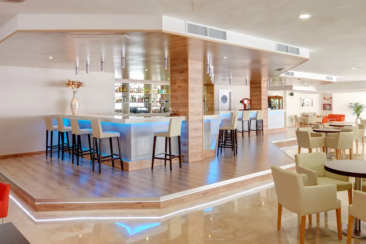 Lounge bar at Grupotel Port d'Alcúdia with illuminated stools in Alcúdia