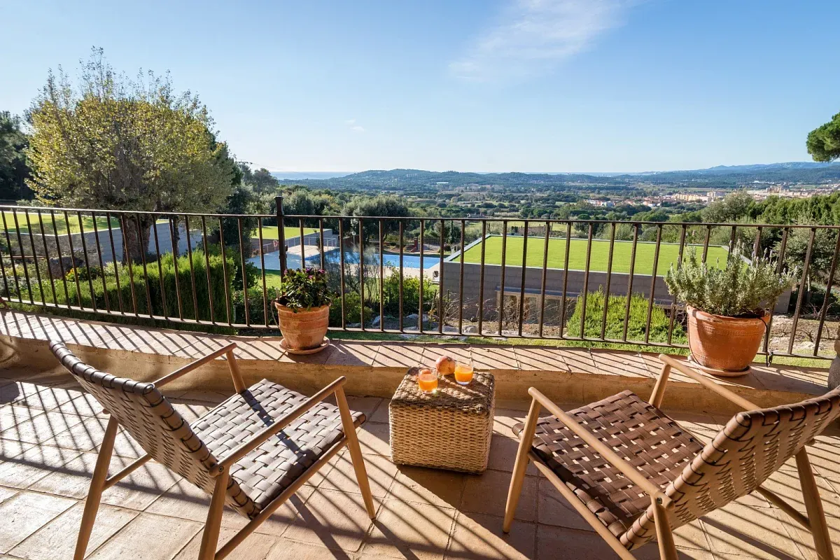 Balcony with countryside view at Hotel Mas Ses Vinyes in Begur