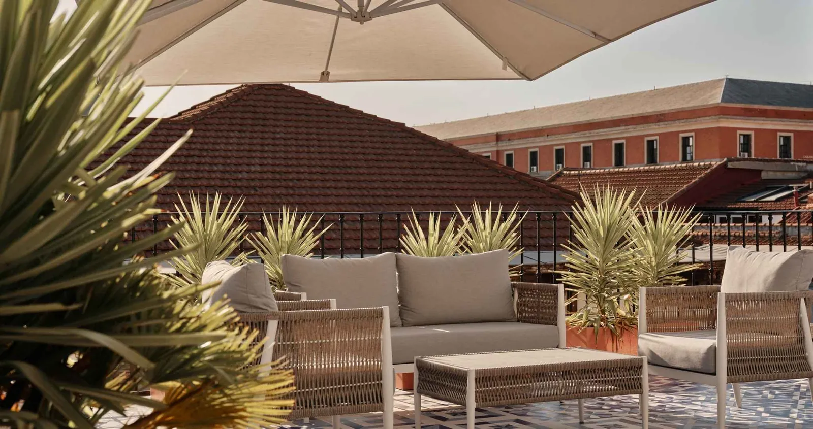 Outdoor terrace with furniture and parasol, Only YOU Boutique Hotel Madrid