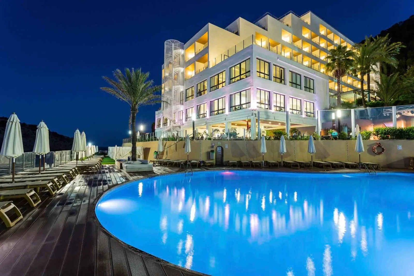 Outdoor pool at Palladium Hotel Cala Llonga in the evening, Ibiza