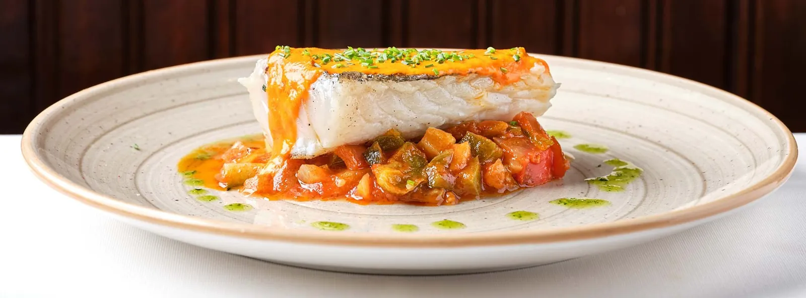 White fish dish plated at Casa Alberto in Madrid