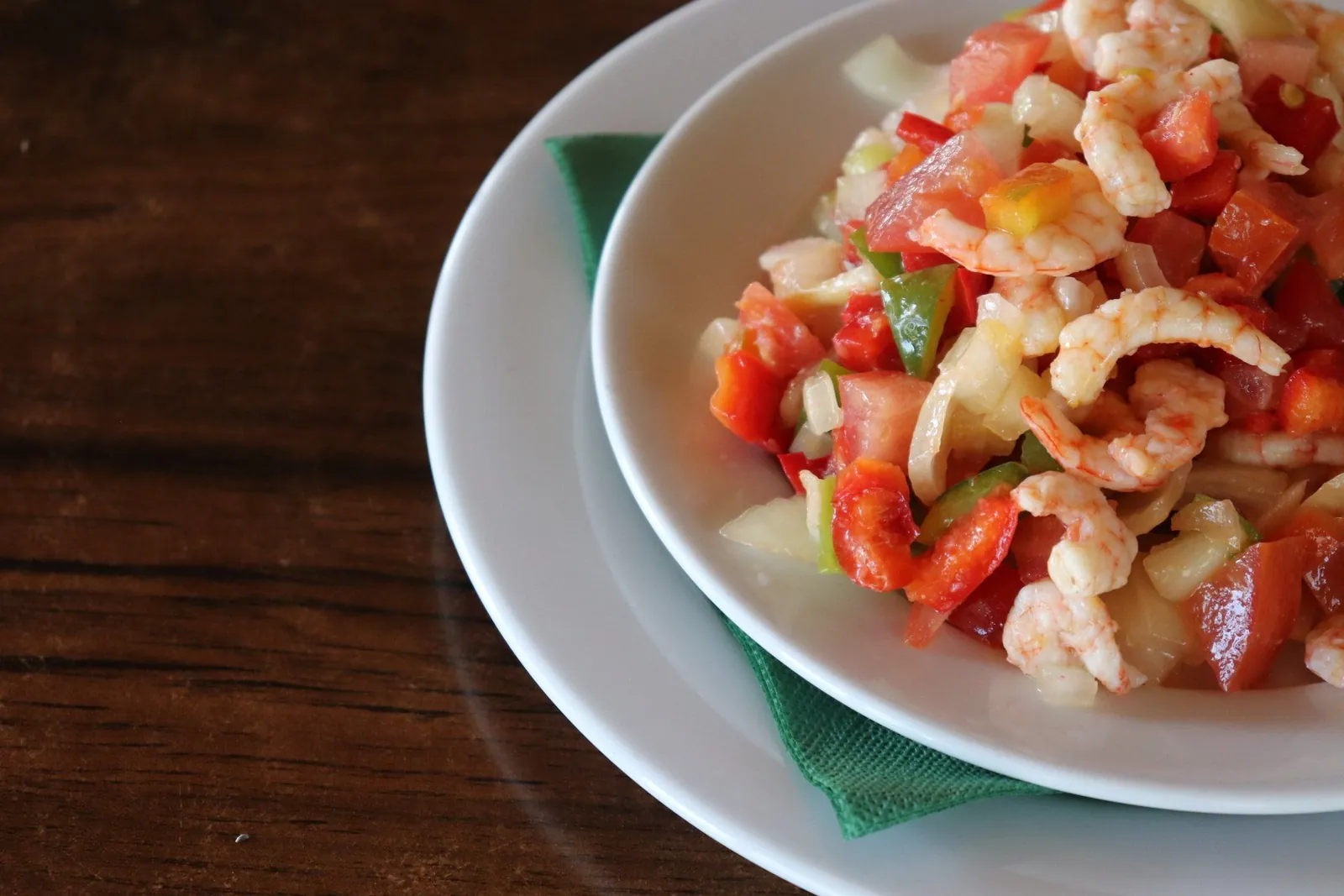 Shrimp and vegetable salad on white porcelain at Doña Gamba in El Rompido