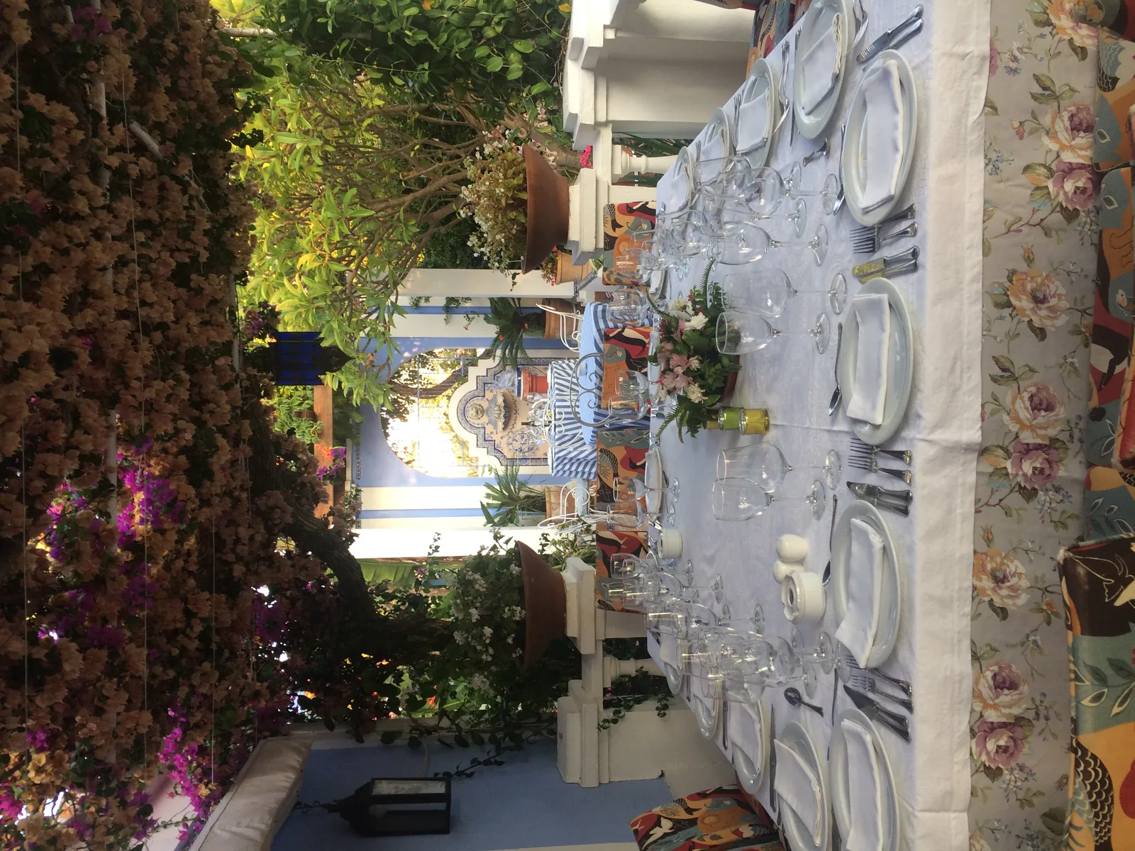 Andalusian terrace of La Tirana in Marbella with tiled wall and plants