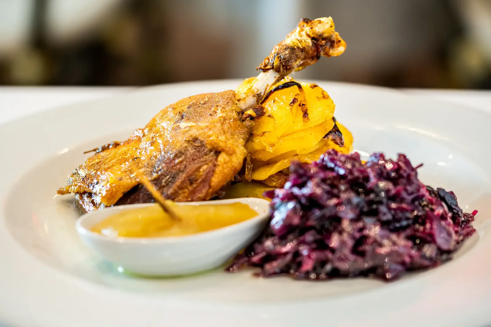 Roast poultry with red cabbage at Los Bandidos restaurant in Puerto Banús