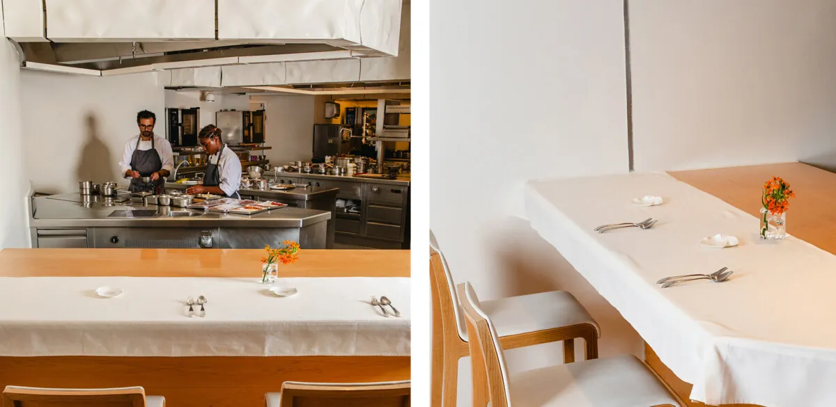 Open kitchen and laid table at Nerua Guggenheim Bilbao restaurant