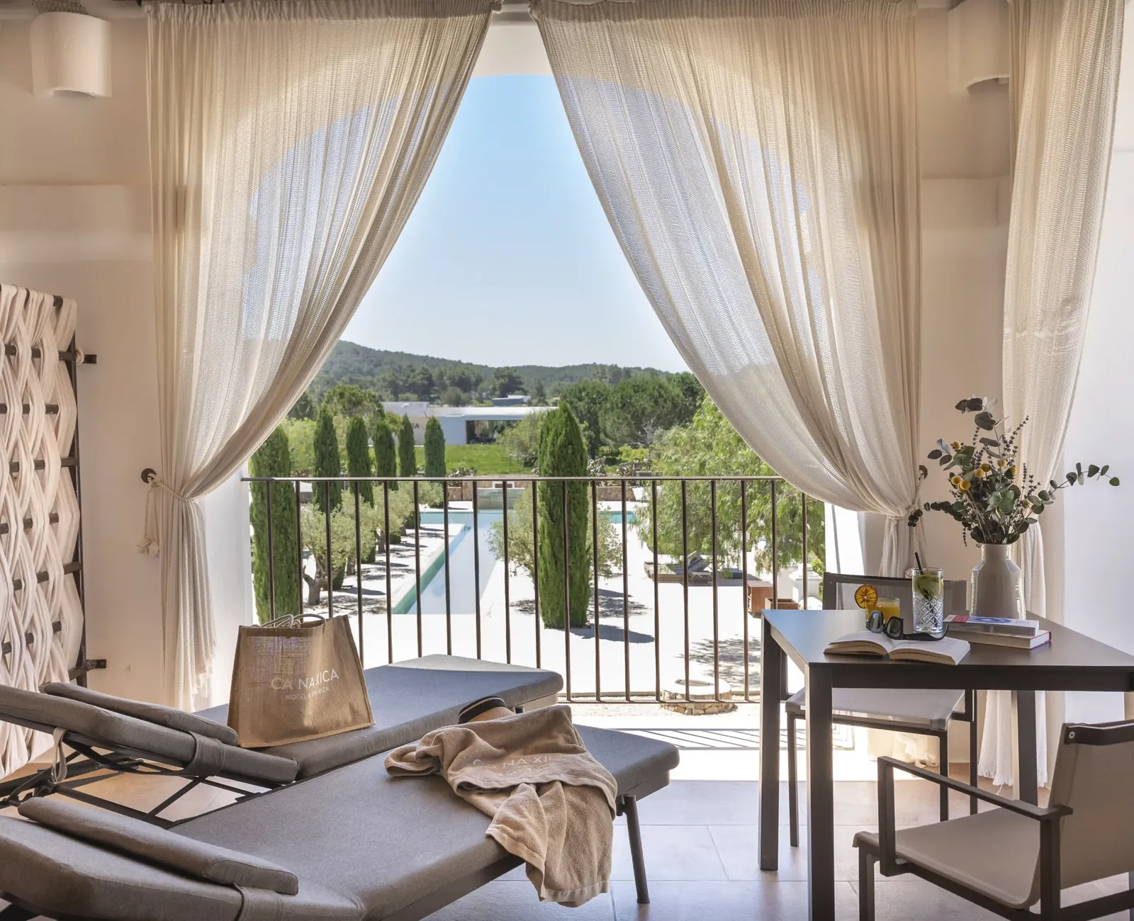 Terrace overlooking the pool and the Sant Miquel landscape