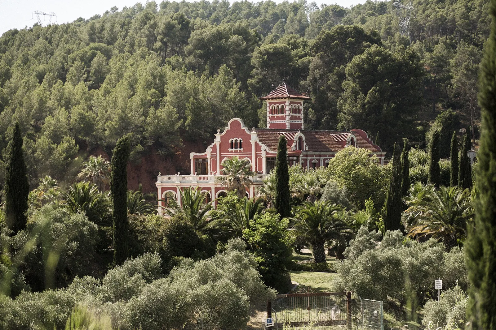 Overview of the Indian-style house set in its garden