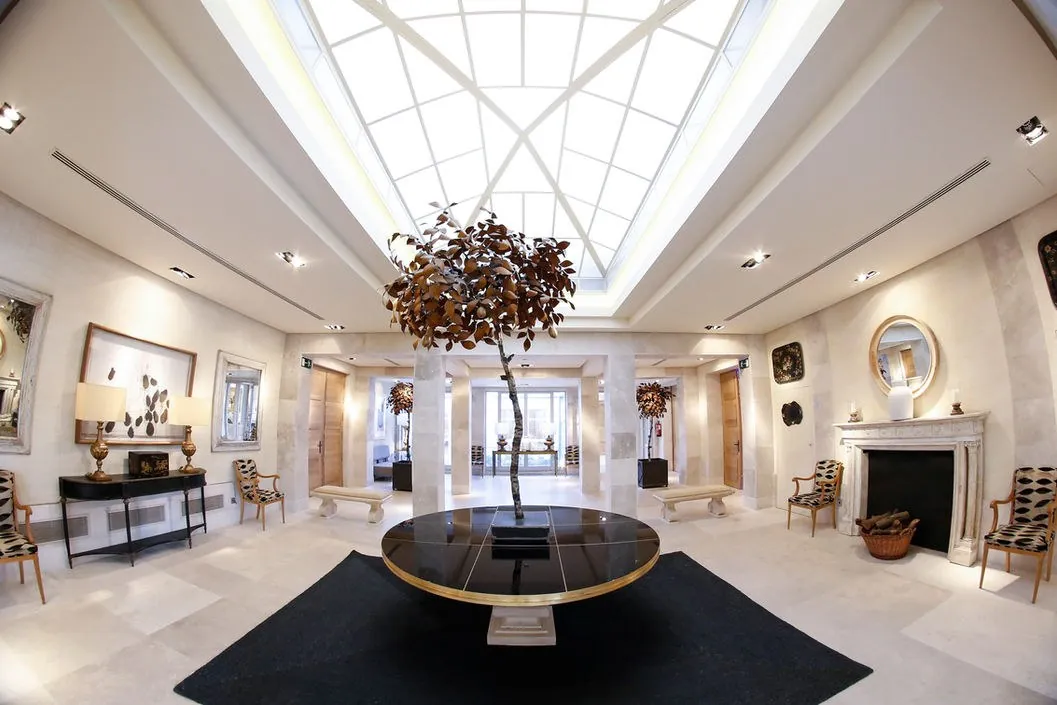 Bright hall of Laureana Business Center under a glass roof, Madrid